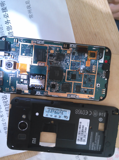 小米2s带套划去洗脸盆几秒手机主板报废设计太差