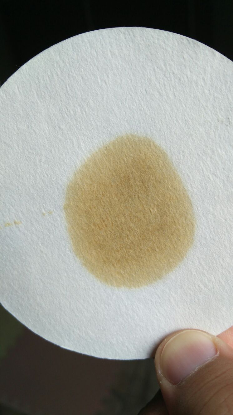 大家帮忙看看这个机油测试滤纸,应该要换了吧