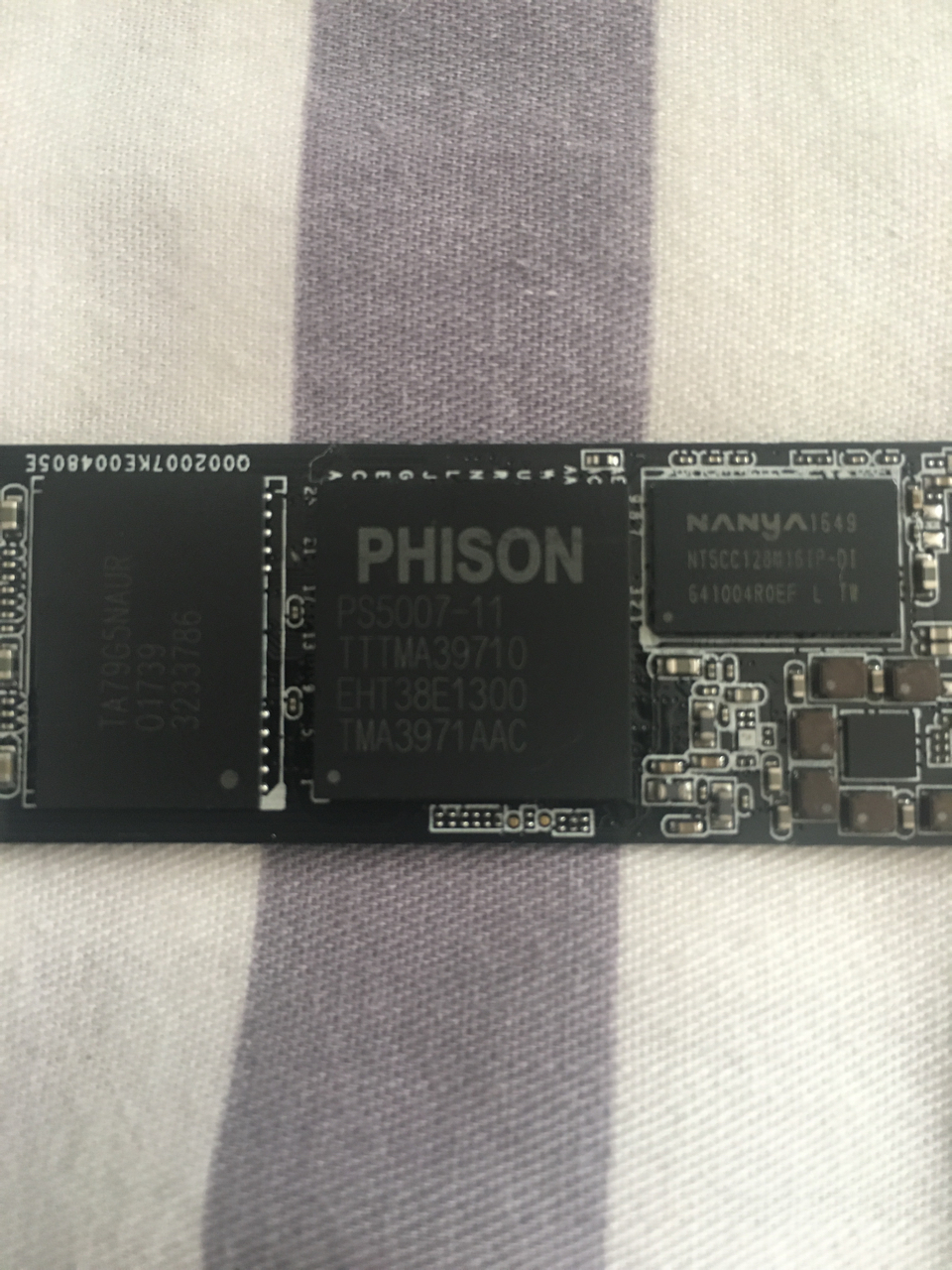 建兴t10的大神看看为什么这么低颗粒主控我拍了照片