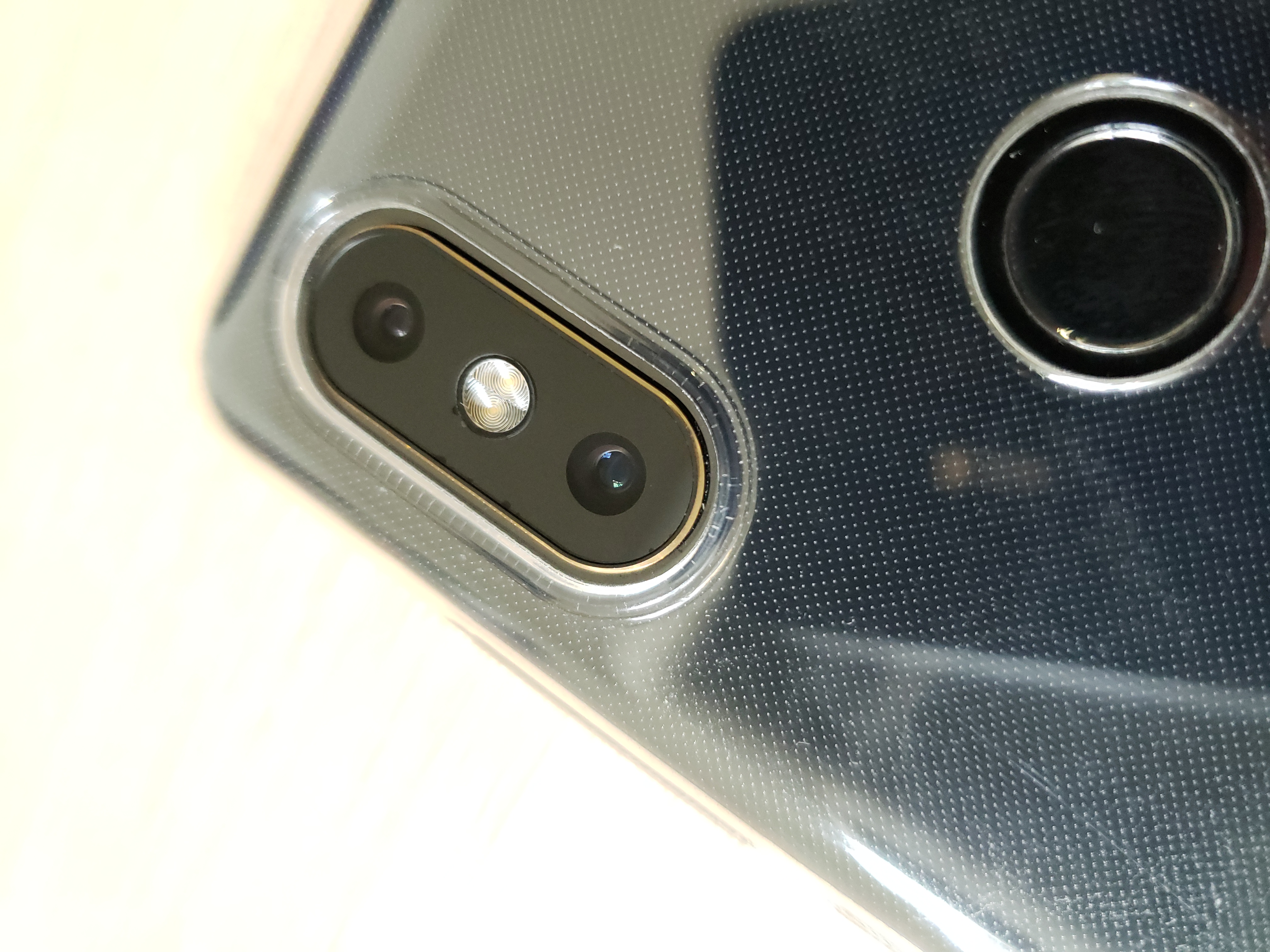 mix2s手机镜头膜脱落