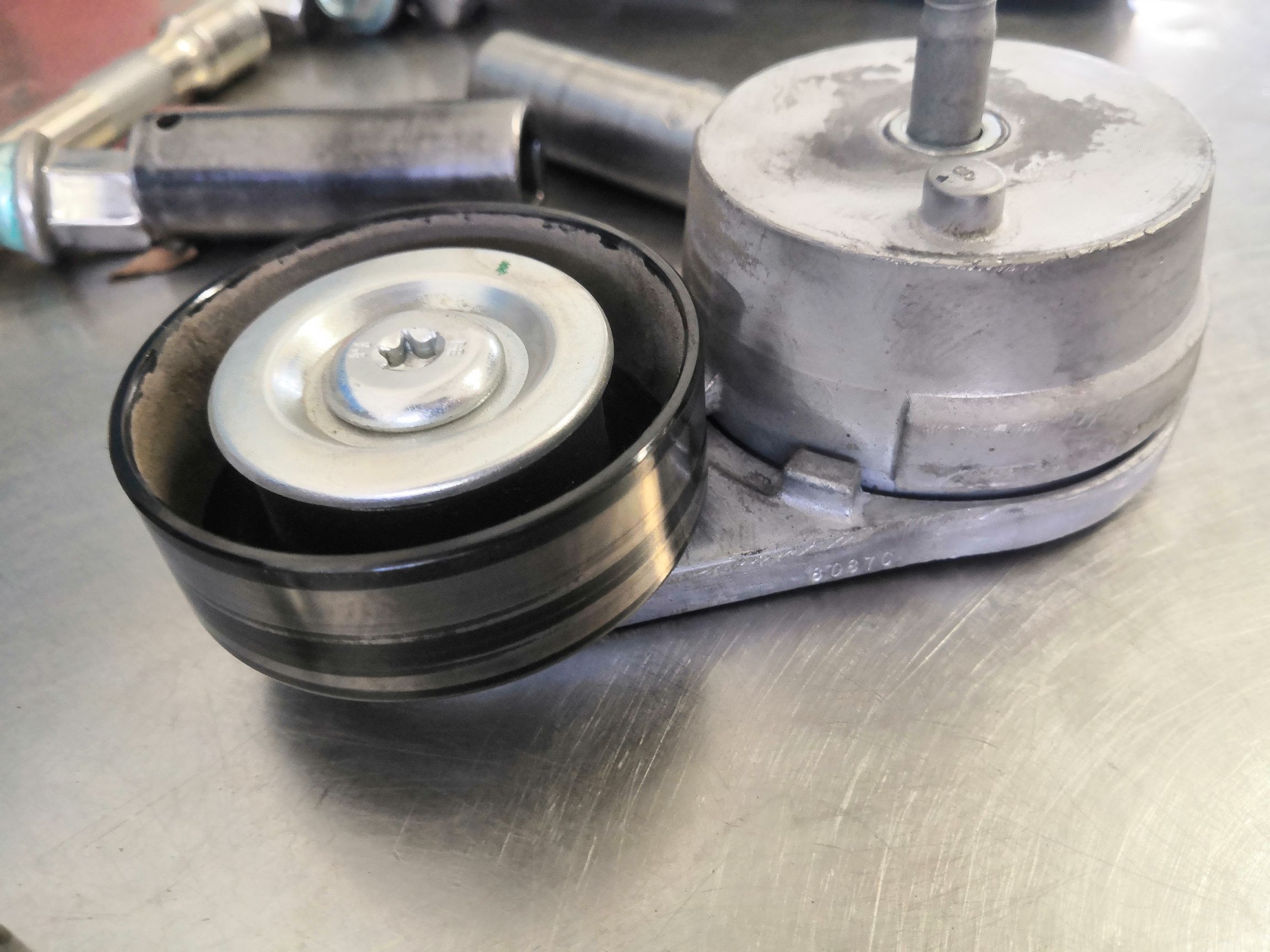 皮带涨紧轮异响