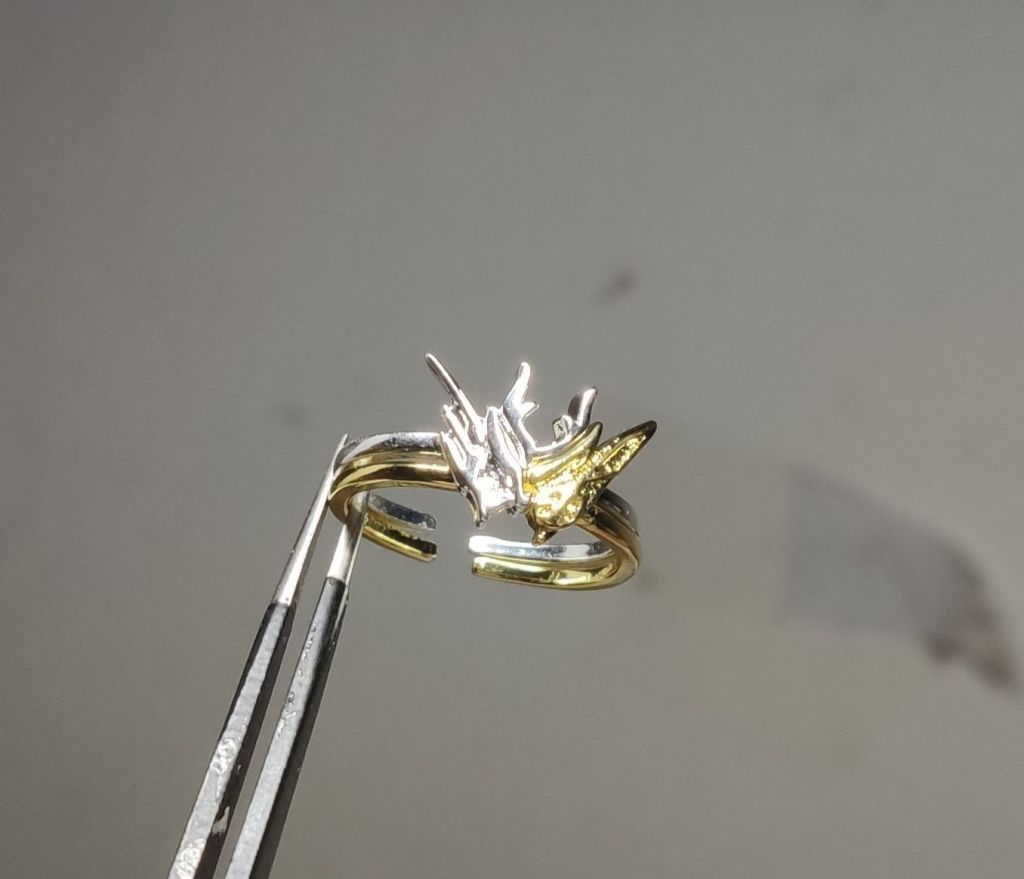 到货乱氵金兔银龙戒指