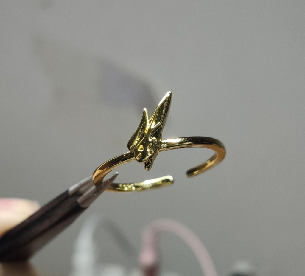 到货乱氵金兔银龙戒指