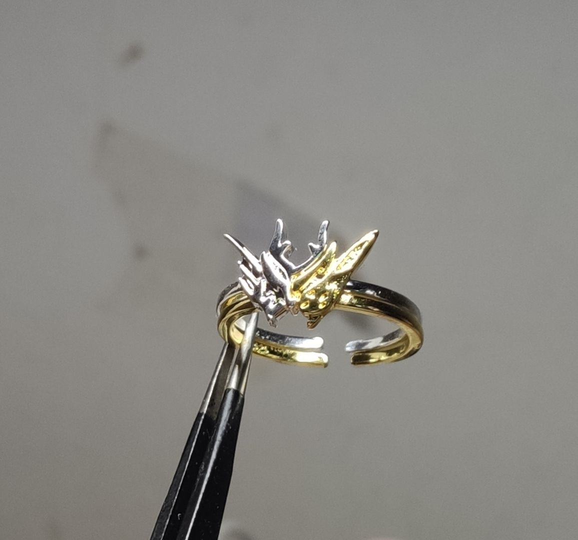 到货乱氵金兔银龙戒指