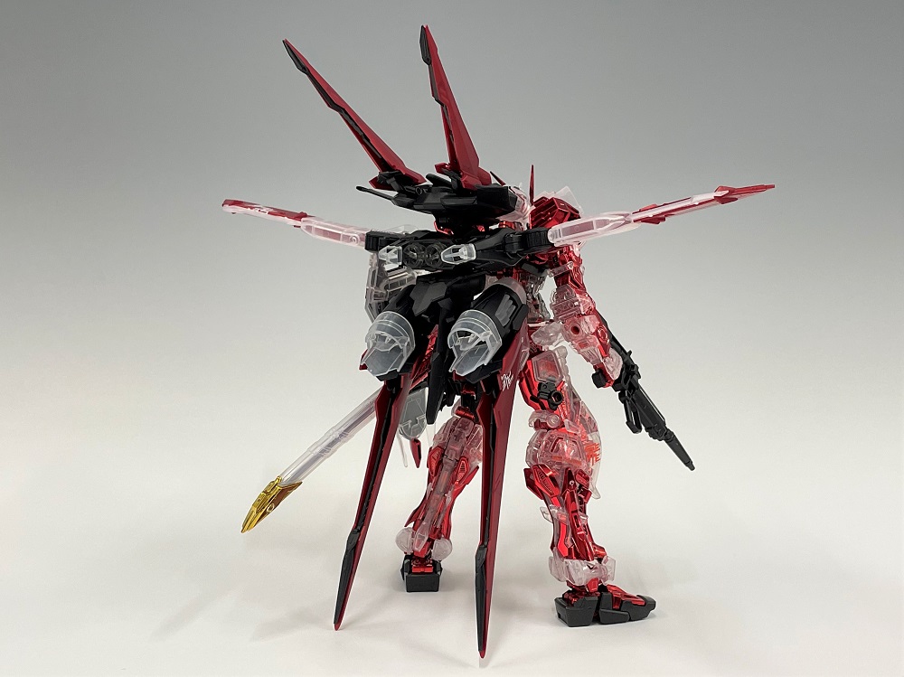 新闻资讯mg1100高达基地限定异端高达红色机飞行装备电镀骨架彩透版官