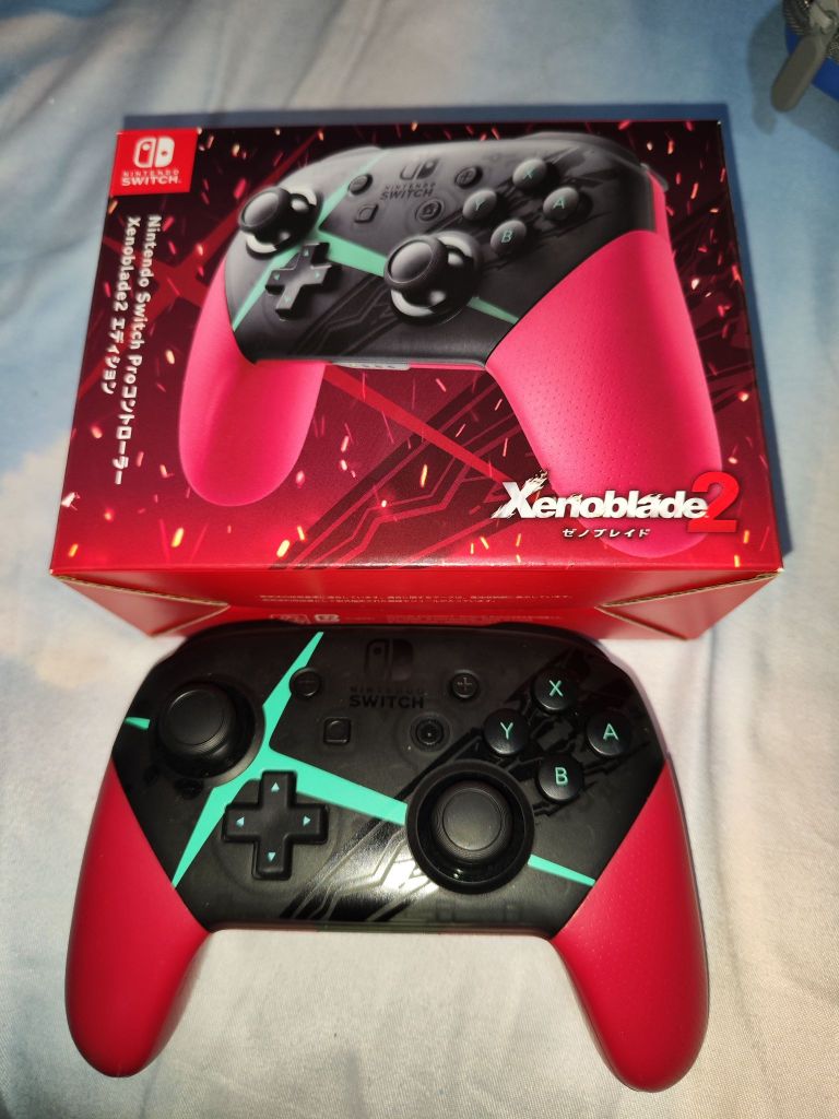 已出 1700出个日版红蓝ns oled,可 300带一个异度之刃pro手柄