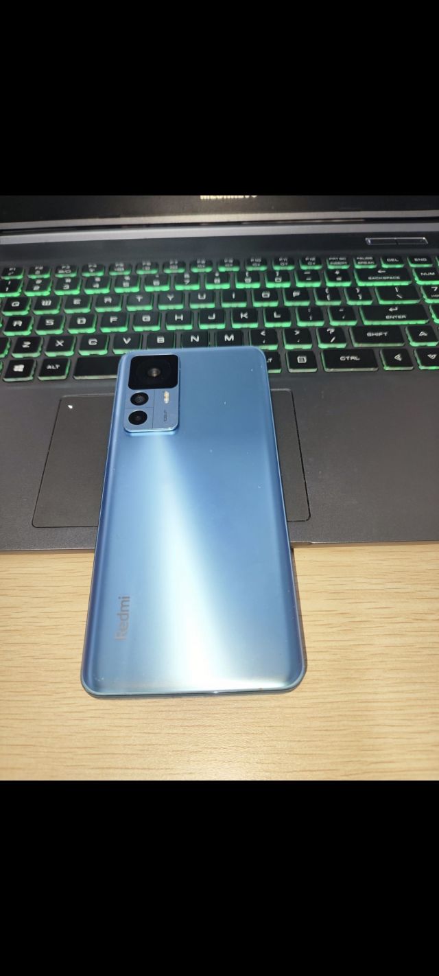 出一个红米k50至尊版12256冰蓝